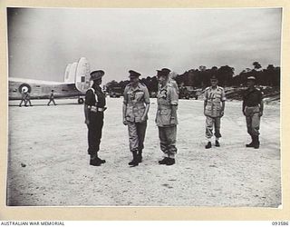JACQUINOT BAY, NEW BRITAIN. 1945-07-01. HIS ROYAL HIGHNESS, THE DUKE OF GLOUCESTER, GOVERNOR-GENERAL OF AUSTRALIA (2), MEETING CAPTAIN G.C. TERRY, GUARD COMMANDER, 29/46 INFANTRY BATTALION (1), ..