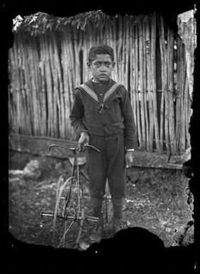 Boy with a tricycle