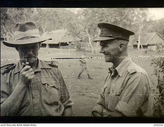 New Guinea. 1943-07-25. The Chaplain General of the Church of England, VX20306 Bishop C. L. Riley, CBE VD, (left) during an inspection tour of the Church of England chaplains in the area. The other ..