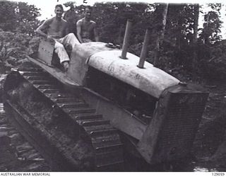 LAE,NEW GUINEA. 1945-12. TRACTOR AND DRIVERS OF 4TH ADVANCED ORDNANCE DEPOT. (DONOR: J. W. K. BEDDOME)