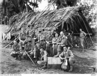 OINYALIB, NEW GUINEA. 1945-07-15. MEMBERS OF 5 DETACHMENT, FIRST ARMY ENTERTAINMENT UNIT, WHO PROVIDED A PROGRAMME OF ENTERTAINMENT FOR FORWARD SECTIONS OF 2/5 INFANTRY BATTALION