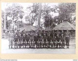 TOROKINA, BOUGAINVILLE. 1945-11-24. PERSONNEL OF THE ADMINISTRATIVE PLATOON, HQ COMPANY, 27 INFANTRY BATTALION. (FOR IDENTIFICATION OF 26 NAMED PERSONNEL REFER TO PROVISIONAL CAPTION OR NAME INDEX)