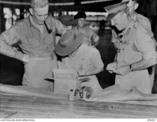 The Right Honourable J B Chifley, Prime Minister of Australia (left) with Lieutenant Colonel Spencer, Controller of Australian Women's Army Service (second from left) and Major General H C H ..