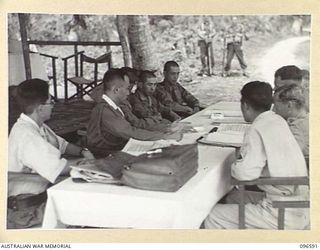 BONIS PENINSULA, BOUGAINVILLE. 1945-09-14. MEMBERS OF HEADQUARTERS 2 CORPS, PREPARED FOR SURRENDER DISCUSSIONS WITH THE JAPANESE, WENT ASHORE AT JAPANESE NAVAL HEADQUARTERS, BONIS PENINSULA. THEY ..