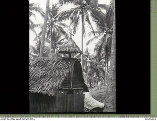 PORT MORESBY, PAPUA. C. 1943. RAAF CHAPLAIN PADRE DEBENHAM'S "LITTLE CHURCH AMONG THE COCONUTS"