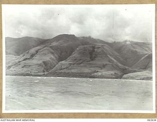 AGO AREA, NEW GUINEA. 1943-12-29. VIEW OF THE BARE RUGGED COASTLINE IN THE VICINITY OF AGO