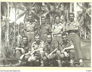 MILILAT, NEW GUINEA. 1944-07-22. PERSONNEL OF THE 5TH SURVEY BATTERY. IDENTIFIED PERSONNEL ARE:- NX108266 GUNNER E.H. TATTERSALL (1); NX108264 GUNNER L.J. MCNAMARA (2); NX155203 GUNNER J.D. ..