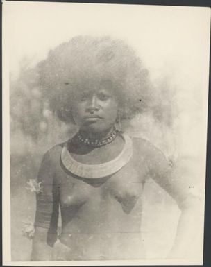 Motuan woman wearing a necklet and flowers, Port Moresby, Papua, ca. 1923 / Sarah Chinnery
