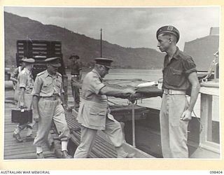 RABAUL, NEW BRITAIN. 1945-10-28. FOLLOWING INSPECTION OF A CEREMONIAL PARADE AND MARCH PAST BY TROOPS OF 11 DIVISION AT THE DIVISION PARADE GROUND, GENERAL SIR THOMAS A. BLAMEY, COMMANDER-IN-CHIEF, ..
