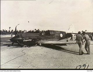 MOMOTE, LOS NEGROS ISLAND, ADMIRALTY ISLANDS. C. 1944-04. ALL IS NOT WITHOUT INCIDENT HOWEVER AT NO. 76 (KITTYHAWK) SQUADRON RAAF. ON THIS MISSION ONE OF THE AIRCRAFT, NICKNAMED COPPERTOP, WAS HIT ..