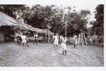 Younger villagers play volleyball