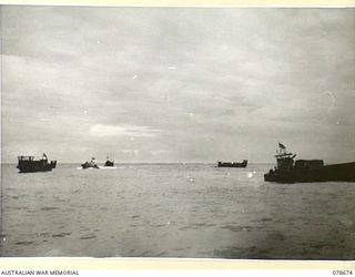 SAMPUN, NEW BRITAIN. 1945-01-27. LCM'S (LANDING CRAFT MECHANISED) OF THE 594TH ENGINEER BOAT AND SHORE REGIMENT, "B" COMPANY, UNITED STATES ARMY WITH TROOPS OF THE 14/32ND AUSTRALIAN INFANTRY ..