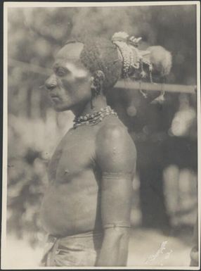 Two Ramu Delta men with one wearing a cuscus fur headdress, Awar, Sepik River, New Guinea, 1935 / Sarah Chinnery