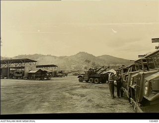 Port Moresby, New Guinea. 1944-05-30. This Australian Electrical and Mechanical Engineers (AEME) Workshop Section, located within the Ordnance Vehicle Park, effects minor repairs to vehicles ..