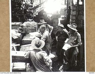 FINSCHHAFEN AREA, NEW GUINEA. 1943-11-13. SUPPLIES BEING ISSUED ON THE DAY THE NEW CANTEEN ISSUING POINT, FOWARD AREA, WAS OPENED