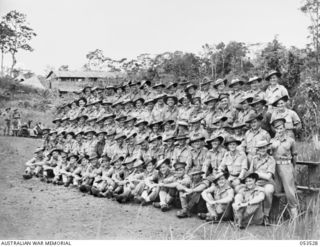 SOGERI VALLEY, NEW GUINEA, 1943-06-26. STAFF OFFICERS AND OTHER RANKS OF THE NEW GUINEA FORCE SCHOOL OF SIGNALS. LEFT TO RIGHT: BACK ROW - QX54840 SIGNALMAN (SIG) W. M. E. GAULD; QX40429 CORPORAL ..