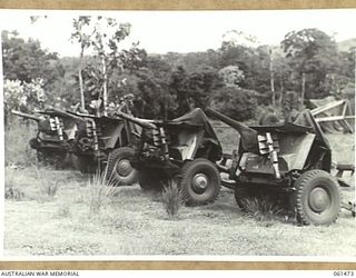 PORT MORESBY, NEW GUINEA. 1943-12-07. ORDNANCE PARK OF NO. 3 SUB DEPOT 10TH AUSTRALIAN ADVANCED ORDNANCE DEPOT SHOWING 2-POUNDER TANK ATTACK GUNS READY FOR DELIVERY TO UNITS