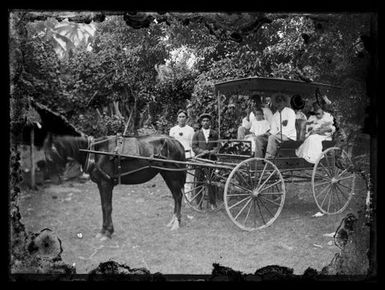 Group inside a horse drawn wagon