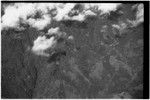 Aerial view of mountains, paths and garden clearings visible