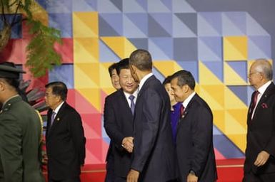 Barack Obama joins Asia Pacific Economic Cooperation Summit leaders for a photo in Manila, Philippines, November 19, 2015