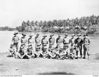 Group portrait of members of the Camp Staff of Headquarters, 5th Division. Identified personnel are, front row (seated), left to right: QX49682 Private (Pte) W C Mckay; Pte H Simpson; QX51004 Pte F ..