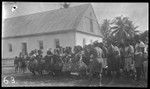 Group dancing by a building