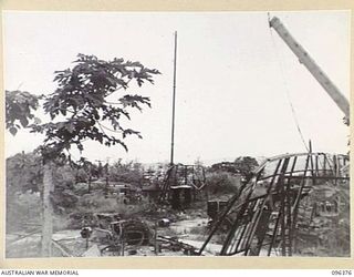 RABAUL, NEW BRITAIN, 1945-09-10. JAPANESE WIRELESS STATION NEAR THE TOWNSHIP WHICH WAS DESTROYED DURING ALLIED AIR ATTACKS. FOLLOWING THE SURRENDER OF THE JAPANESE THE AREA IS NOW OCCUPIED BY ..