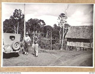 ILLOLO, NEW GUINEA. 1943-12-25. ILLOLO CAMP. IDENTIFIED PERSONNEL IS: NX23283 CAPTAIN W. A. KEINZLE, MBE., (1)