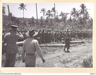 MUSCHU ISLAND, NEW GUINEA. 1945-09-24. THE ENTIRE JAPANESE PERSONNEL ON MUSCHU ISLAND ASSEMBLED FOR INSPECTION BY MAJOR GENERAL H.C.H. ROBERTSON, GENERAL OFFICER COMMANDING 6 DIVISION, MAJOR ..