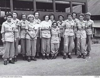 LAE, NEW GUINEA. 1945-12. AWAS AT THE 4TH ADVANCED ORDNANCE DEPOT. SHOWN: NF455505 PRIVATE (PTE) P. C. RYAN (1); NF464082 PTE B. M. SHUTE (2); WF93570 PTE R. MCLEOD (3); NG464223 PTE R. M. MCNEIL ..