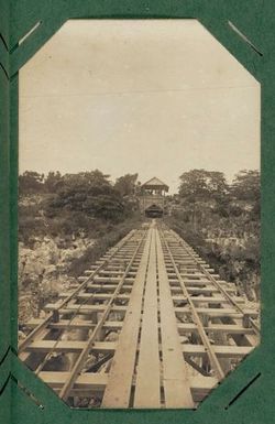 View along the wharf to the loading shelter.  From the album: Banaba (Ocean Island)