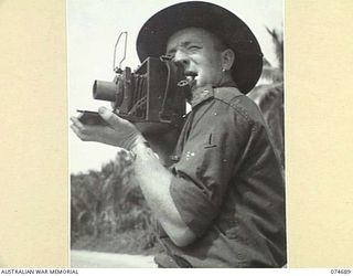 BASAMA, NEW GUINEA. 1944-07-13. NX56998 WARRANT OFFICER II, D. MARTIN, PHOTOGRAPHER, MILITARY HISTORY SECTION ATTACHED TO HEADQUARTERS NEW GUINEA FORCE