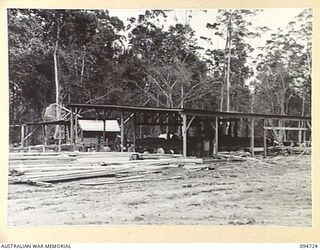 YALU AREA, NEW GUINEA, 1945-07-30. THE SAWMILL AND YARD OF NO. 2 PLATOON, 2/1 FORESTRY COMPANY, ROYAL AUSTRALIAN ENGINEERS, PHOTOGRAPHED AT THE REQUEST OF THE COMMANDING OFFICER