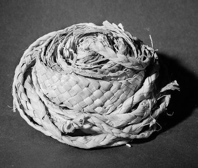 ["Diaper (Fafafafine), plaited straw, Vaitupu, Ellice Islands, Western Pacific. Presented by Dr. D. G. Kennedy"]