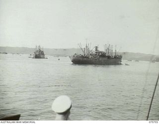 HUMBOLT BAY, NEW GUINEA. 1944-09/08. ALLIED MERCHANT SHIPS ANCHORED IN THE BAY