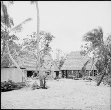 Three huts under construction, Fiji, 1966 / Michael Terry
