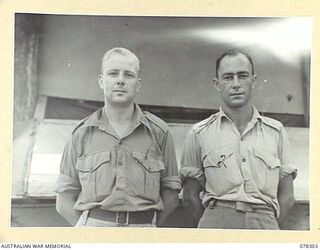 SIPAAI, BOUGAINVILLE ISLAND. 1945-01-08. PERMIT PHOTOGRAPHS TAKEN FOR THE 101ST FIELD SECURITY SECTION AND THE 29TH FIELD SECURITY SECTION. SEEN ARE:- VX100702 LANCE CORPORAL L.J. PALMER (1); ..