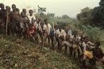 Boys playing outside of village after school