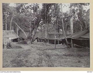 SORAKEN AREA, BOUGAINVILLE. 1945-04-03. THE MAIN DRESSING STATION, 19 FIELD AMBULANCE, SHOWING CAMP LINES, THE REGIMENTAL AID POST AND A HOSPITAL WARD