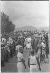 Government-sponsored festival in Tabibuga: patrol officer Jack Edwards with luluais and large crowd