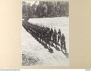 BOUGAINVILLE, SOLOMON ISLANDS, 1944-12-21. B COMPANY, 42 INFANTRY BATTALION MARCHING FROM THE PARADE GROUND AFTER THE GENERAL SALUTE HAD BEEN TAKEN BY MAJOR-GENERAL W. BRIDGEFORD, GENERAL OFFICER ..