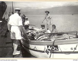 LAE, NEW GUINEA. 1944-08-18. LIFEBOATS LOADED WITH PATIENTS FROM THE 2/7TH GENERAL HOSPITAL READY TO MOVE OUT TO THE 2/1ST HOSPITAL SHIP, "MANUNDA" WHICH IS MOORED IN THE STREAM SOME DISTANCE FROM ..