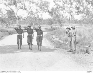 POM POM VALLEY, NEW GUINEA. 1943-11-27. THREE MEMBERS OF THE 18TH AUSTRALIAN INFANTRY BRIGADE GUARD UNIT SX931 PRIVATE E. THOMAS (1); SX855 PRIVATE A. W. RAMSDEN (2); NX150251 CORPORAL P. G. ..