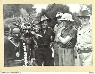 HIGITURA, NEW GUINEA. 1944-04-27. THE HONOURABLE E.J. WARD, MINISTER FOR EXTERNAL TERRITORIES IN THE AUSTRALIAN GOVERNMENT (1), WITH NX191031 LIEUTENANT-COLONEL A.A. CONLON, DIRECTORATE OF ARMY ..