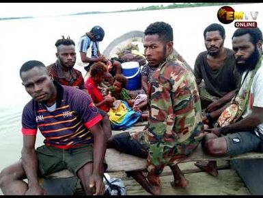 MASSACRE SUSPECTS SURRENDER