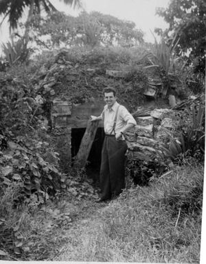 U.S. Reparations Mission Team Members Examines Japanese Dugouts, Guam Island