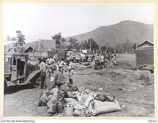 RABAUL, NEW BRITAIN, 1945-12-05. SUSPECTED JAPANESE WAR CRIMINALS WERE ROUNDED UP AND DETAINED IN A COMPOUND IN HQ 11 DIVISION AREA AND DETAINED IN A COMPOUND AT HQ 11 DIVISION AND GUARDED BY ..