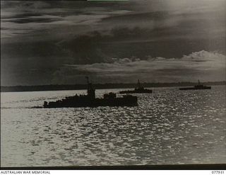 Puriata River Area, Bougainville. 1944-12-31. Landing Craft Infantry (LCI) gunboats of 2 Australian Corps Headquarters silhouetted in the sunlight during the action