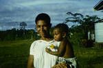 Woman holding a child, Lae