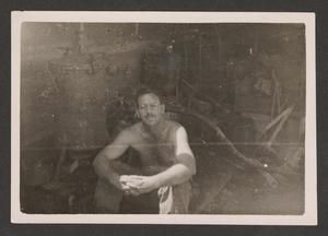 [Elmer Johnston with Washing Machine]